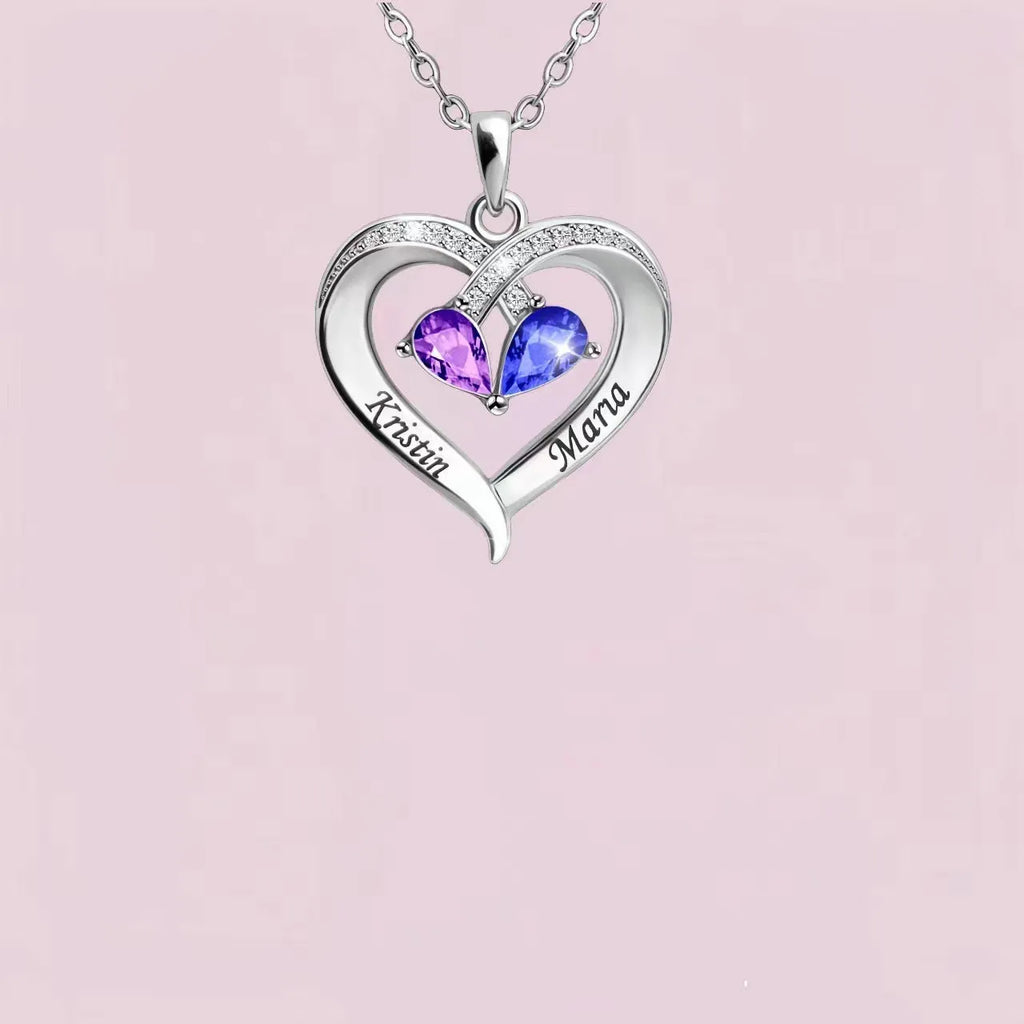 Two-colour water drop heart shape pendant necklace with diamond and birthstone on a gold chain.