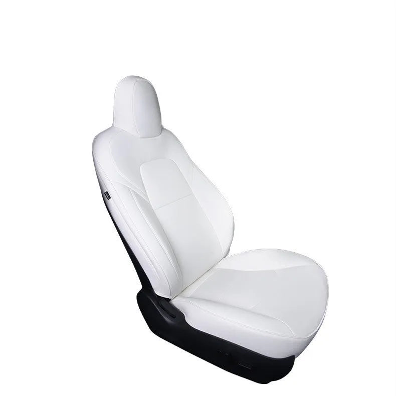 Black and white PVC car seat covers fitted on Tesla Model 3 and Y front and rear seats.