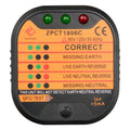 Black UK electrical socket tester showing LED indicators for ground and polarity detection