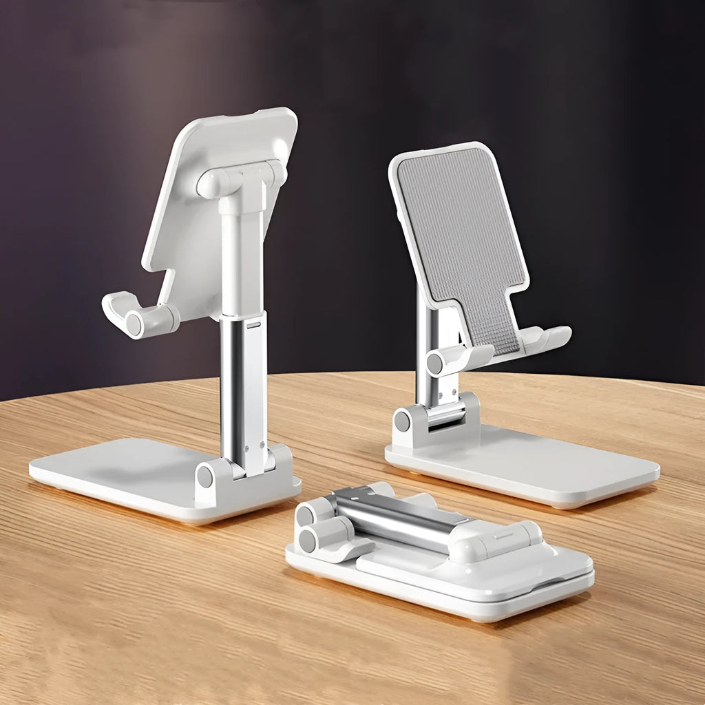 White telescopic folding mobile phone bracket on desktop holding smartphone