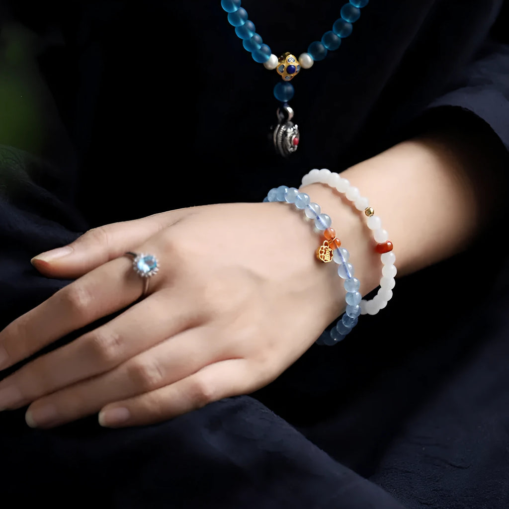 Ice transparent aquamarine crystal bead bracelet with 8mm round beads and sequin detailing