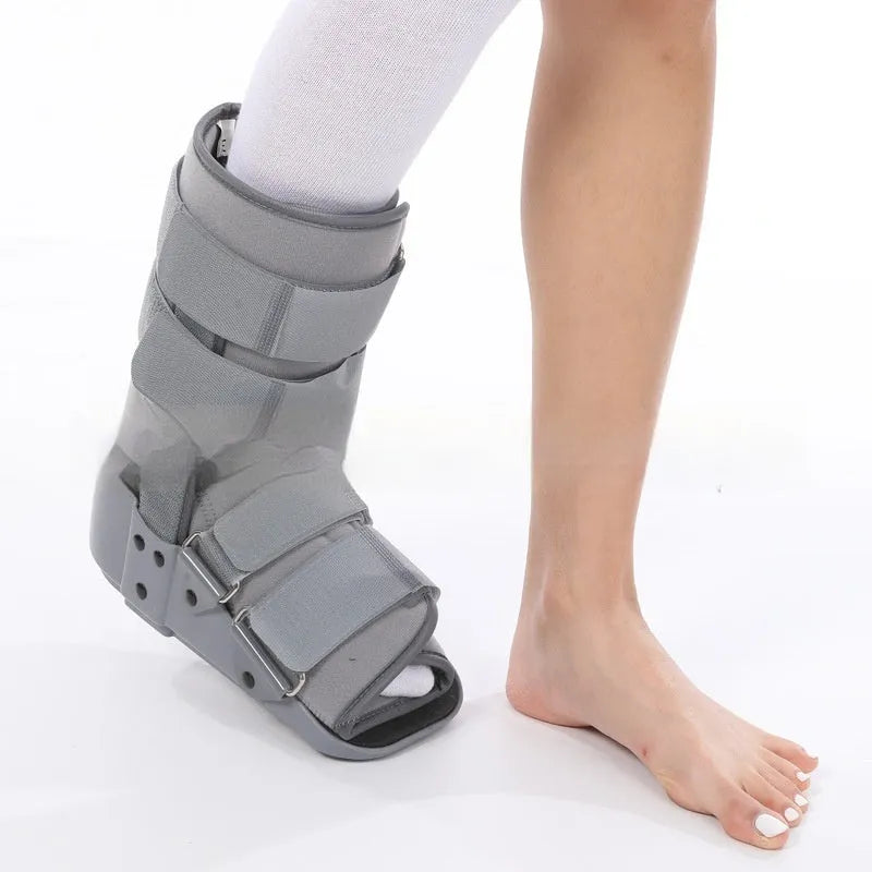Achilles tendon rehabilitation walking shoes showing adjustable straps and hinge mechanism for ankle support