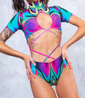 Long sleeve one-piece swimsuit with a high collar tie fastening in a solid colour.