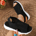 Women's black platform sports sandals with a flat toe bracket and mesh lining on a rubber sole.