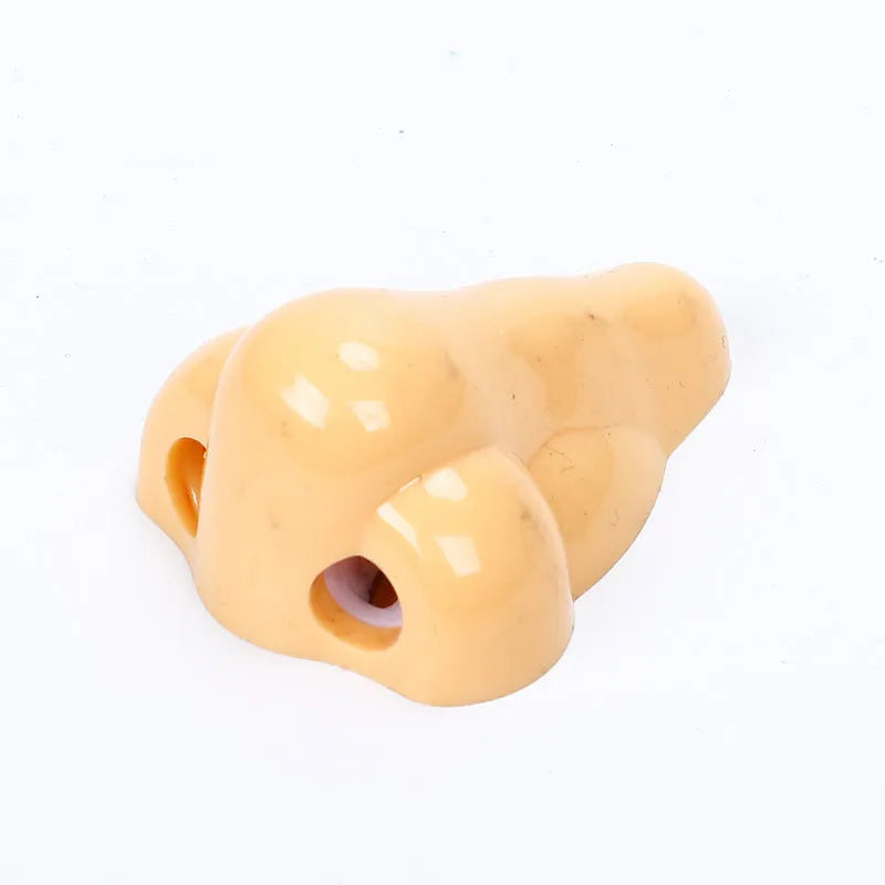 Flesh colour pencil sharpener with 58x45x30mm geometry shape and big nostril design for student stationery