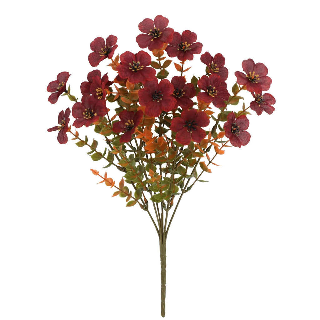 Artificial flower bouquet in autumn colours of red, yellow, and orange for home and event decoration.