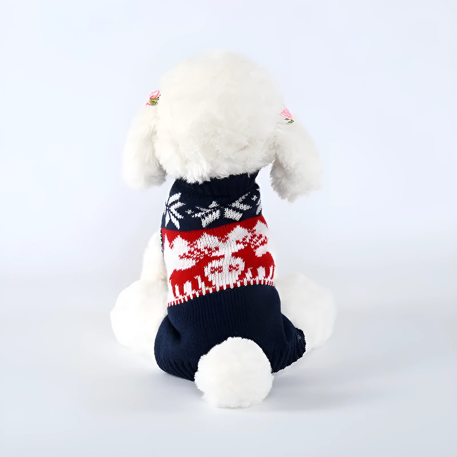 Navy blue knitted dog sweater with Christmas design, sizes XS to L, made from acrylic material.