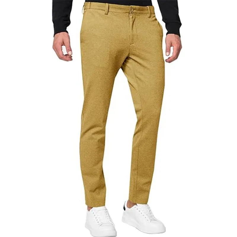 Men's slim-fit tapered chino trousers in a stretch cotton blend fabric, shown in a solid colour.