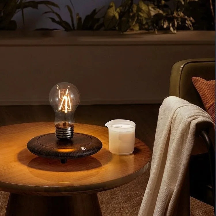 Suspension bulb small night lamp with 11cm square base and iron art body on wooden desk