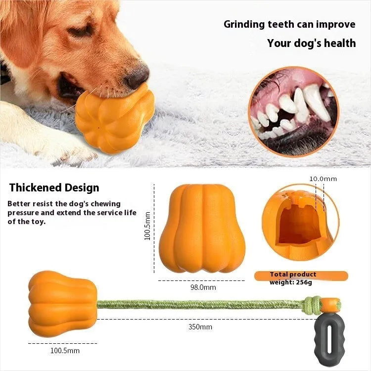 Orange pumpkin-shaped plastic dog toy measuring 10.3cm with optional rope attachment for fetch games