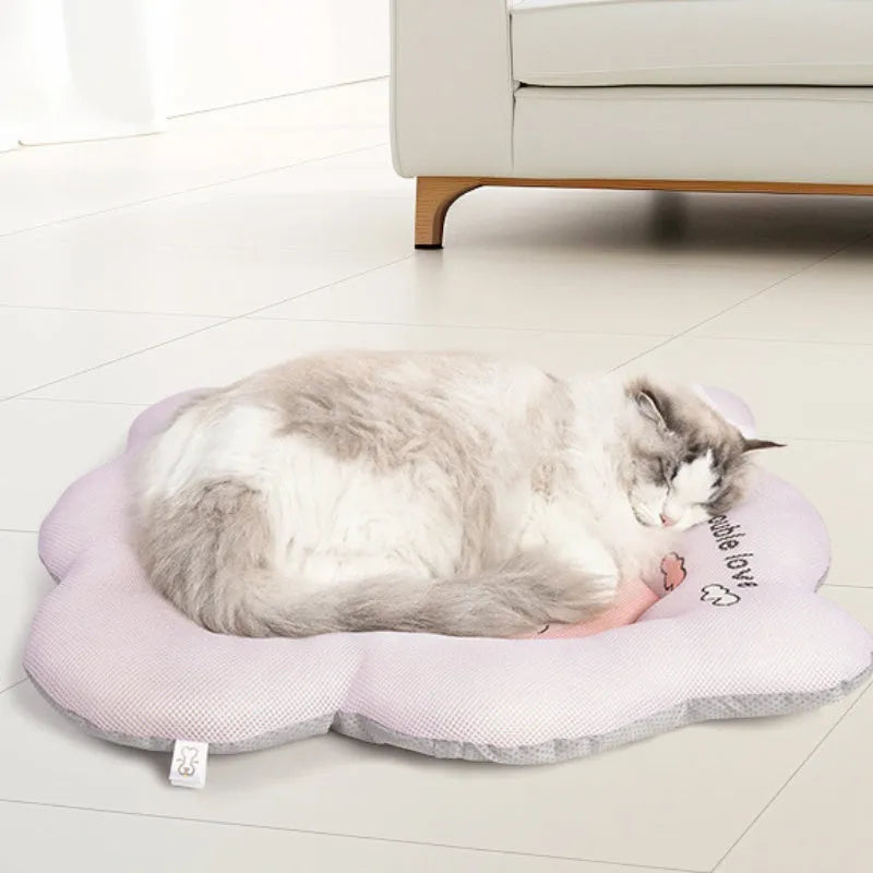 Green pet cooling mat for dogs and cats on floor, showing size options and ice silk gel technology