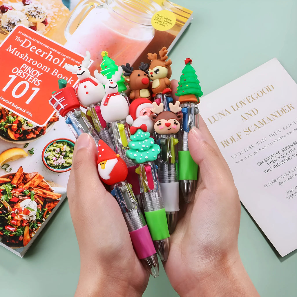 11 cm plastic four-colour Christmas ballpoint pen with press-action top and festive designs.