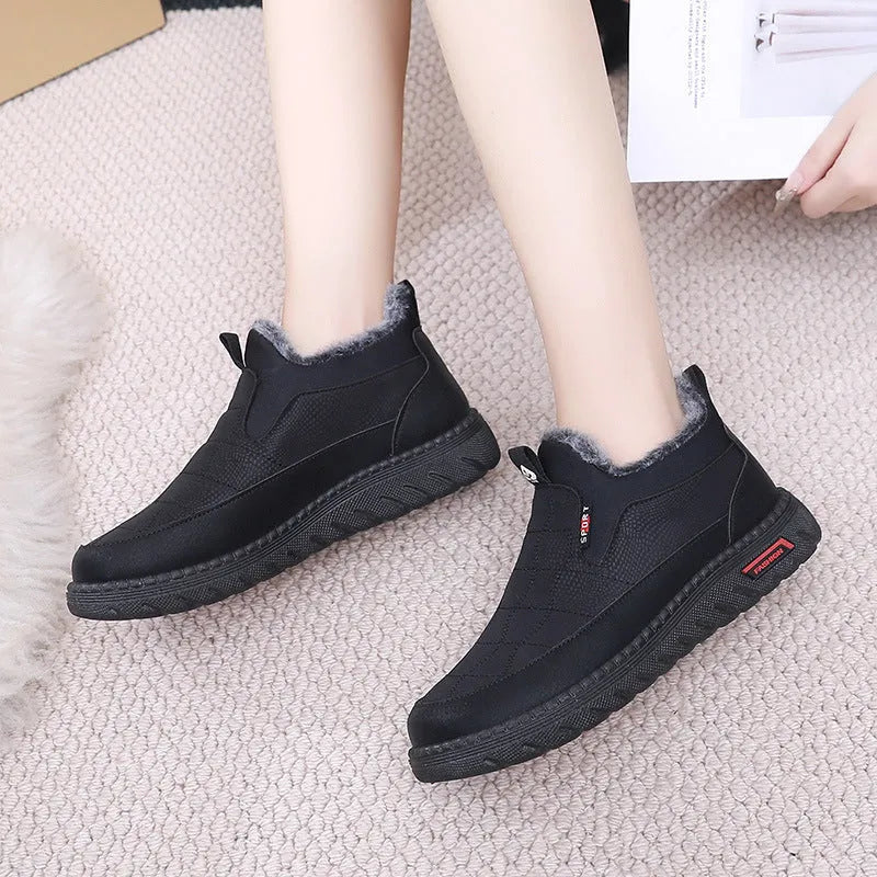 Women's black casual flat boots with round toe and non-slip rubber soles