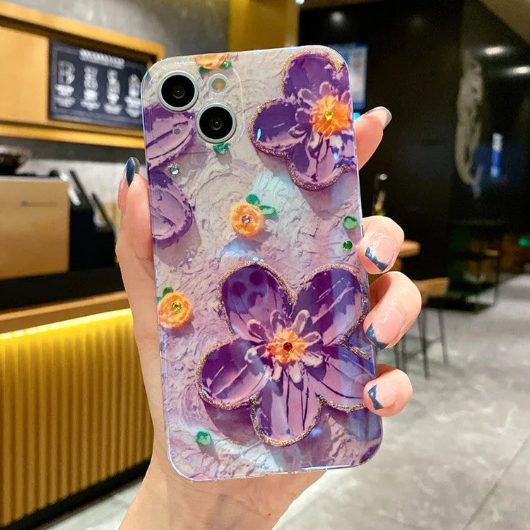 Purple and yellow soft rubber phone cases with oil painting flower designs and diamond accents