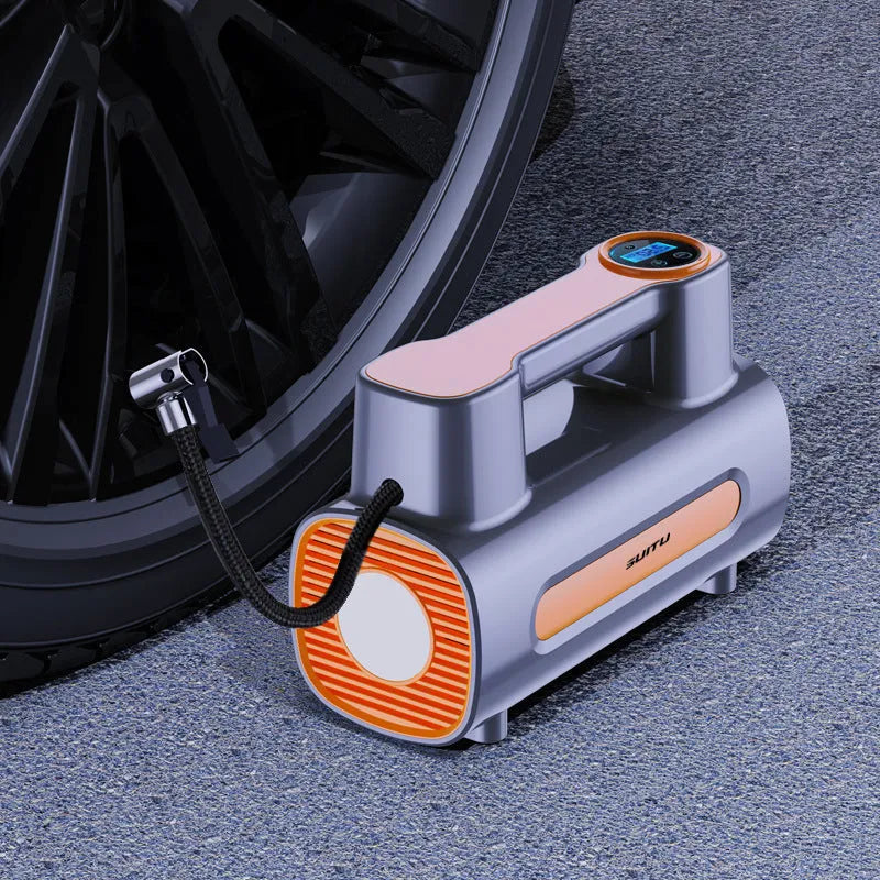 Black portable tyre inflator with digital LCD screen, USB charging port, and built-in battery.
