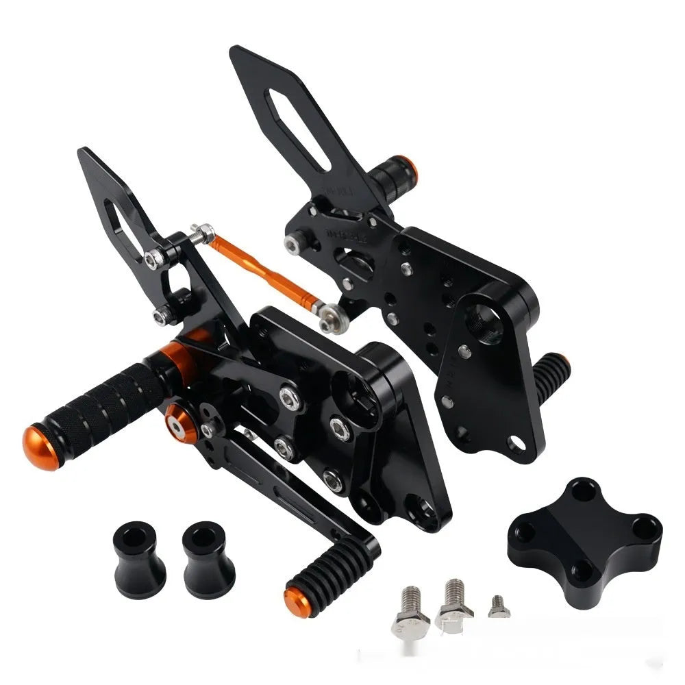 KTM Duke motorcycle rear shift pedal support assembly kit in black and orange.