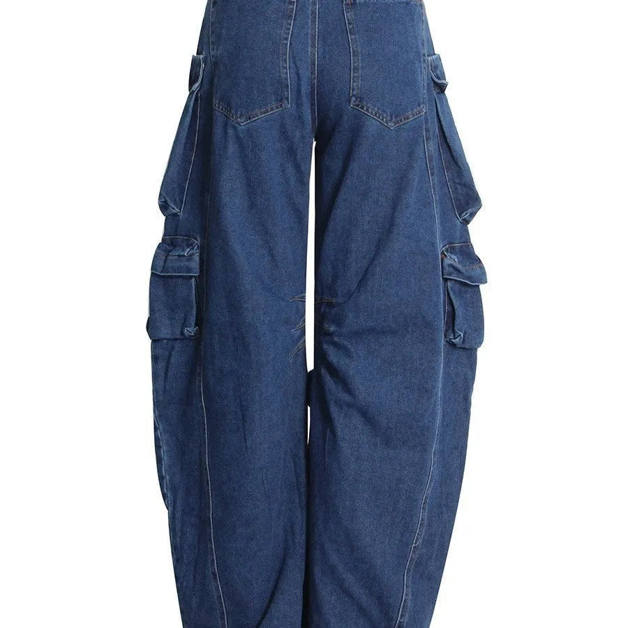 Dark blue distressed wide-leg women's jeans with a high waist and multiple pockets on a mannequin.