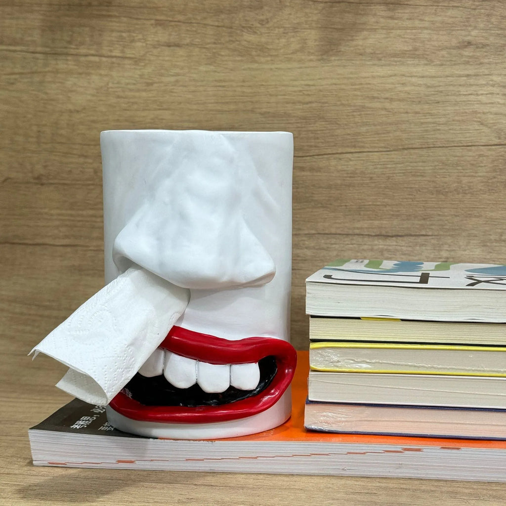 Resin tissue box holder with humorous design, dimensions 8.5cm by 14.6cm, on a desktop