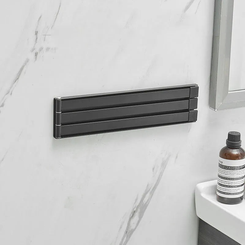 Black folding towel bar with non-perforated installation for bathrooms