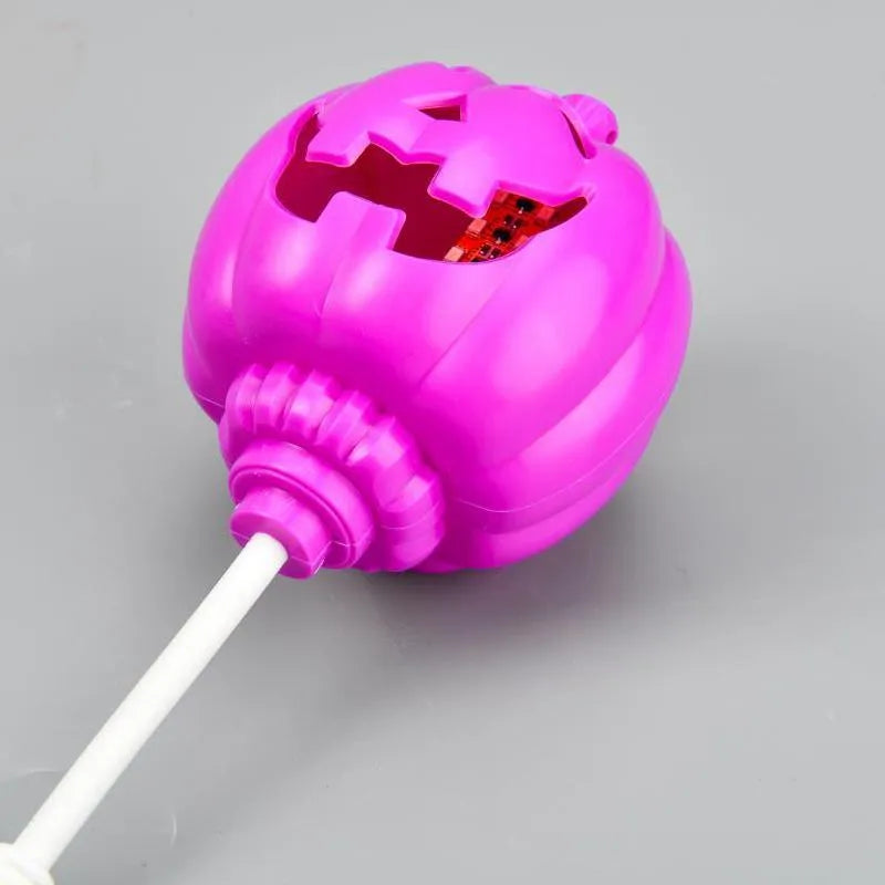Pumpkin-shaped lamp with USB charging, 22cm tall, emitting yellow or purple light for holiday decor