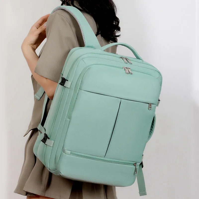 Large capacity backpack showing multiple pockets and zippers, designed for 15.6-inch computers and business travel
