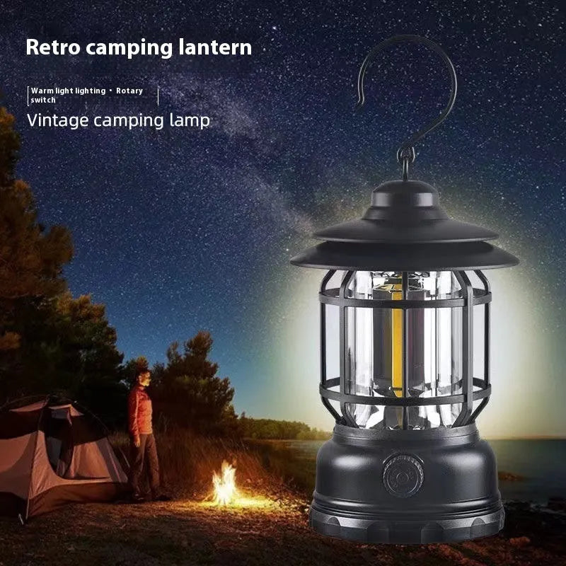 Portable camping lantern measuring 16.6 cm height in dark green, black, and red colours with multiple power options