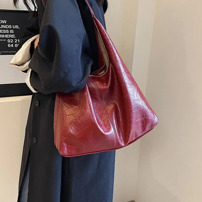 Casual soft PU shoulder bag with sandwich pocket design in black colour showing dimensions and adjustable strap