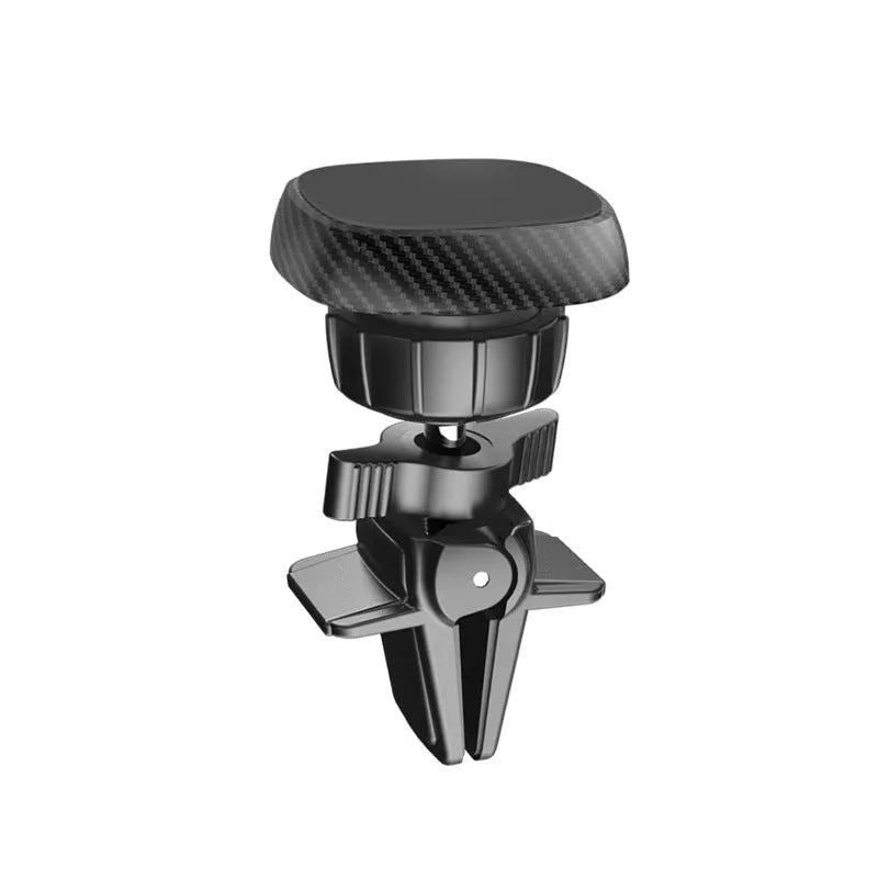 Black magnetic car phone holder attached to air vent with phone secured, showing 360-degree rotation capability