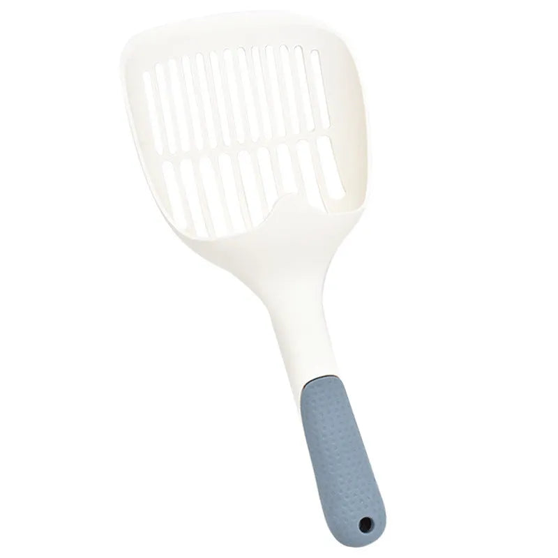 Large white plastic cat litter shovel with a slotted scoop head and handle.