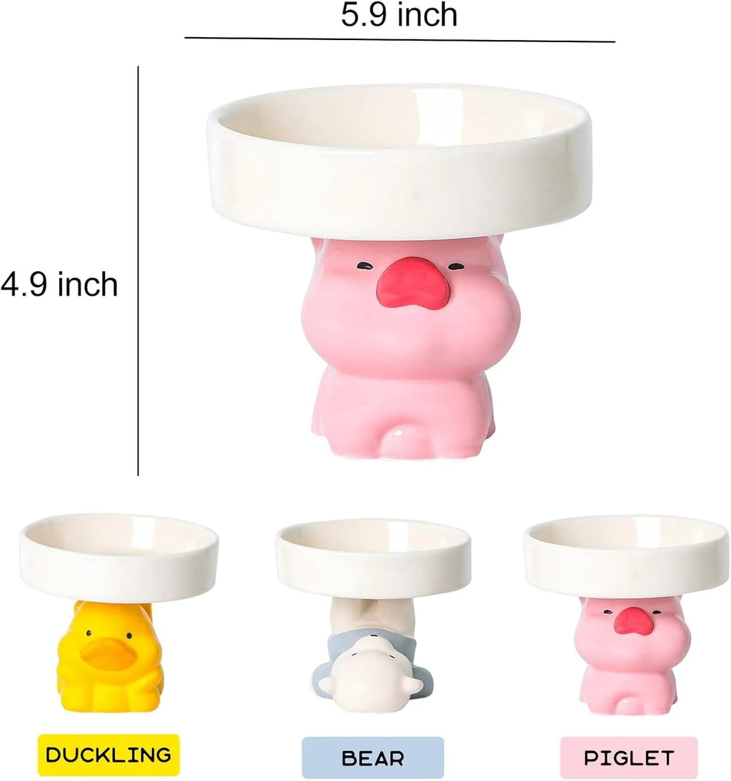Raised ceramic cat bowl with animal design, showing 4.92-inch elevation and 5.9-inch wide opening for whisker-friendly feeding