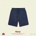 Children's loose fit cotton sports shorts in solid colours on a size chart