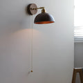Inn Niche Nordic style wooden finish wall mounted bedside lamp with plug.