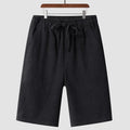 Men's loose linen shorts in beige colour with cropped length and elastic waistband