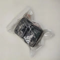 Seat belt buckle protective device in plastic ABS material shown in black and red colour options