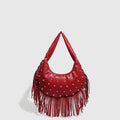 Retro tassel shoulder handbag in wine red with medium hardness construction and internal mobile phone compartment
