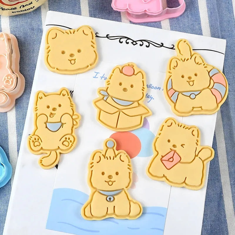 Three-dimensional press mould for creating puppy-shaped biscuits with seven design options including birthday hats