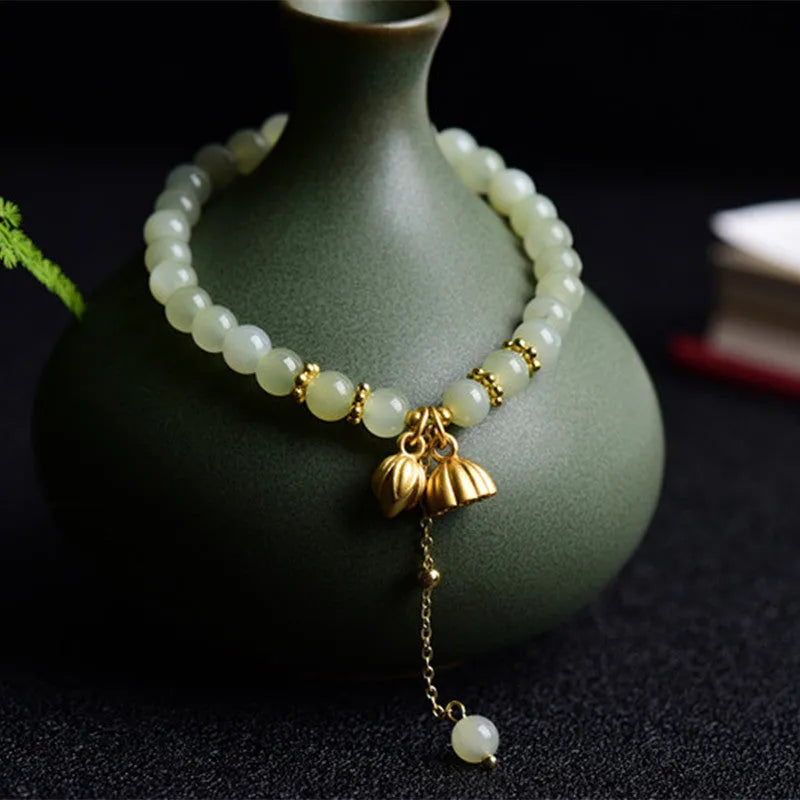 Shihuan natural Hetian jade sunny water bracelet with fu character and constellation detailing on 6mm beads