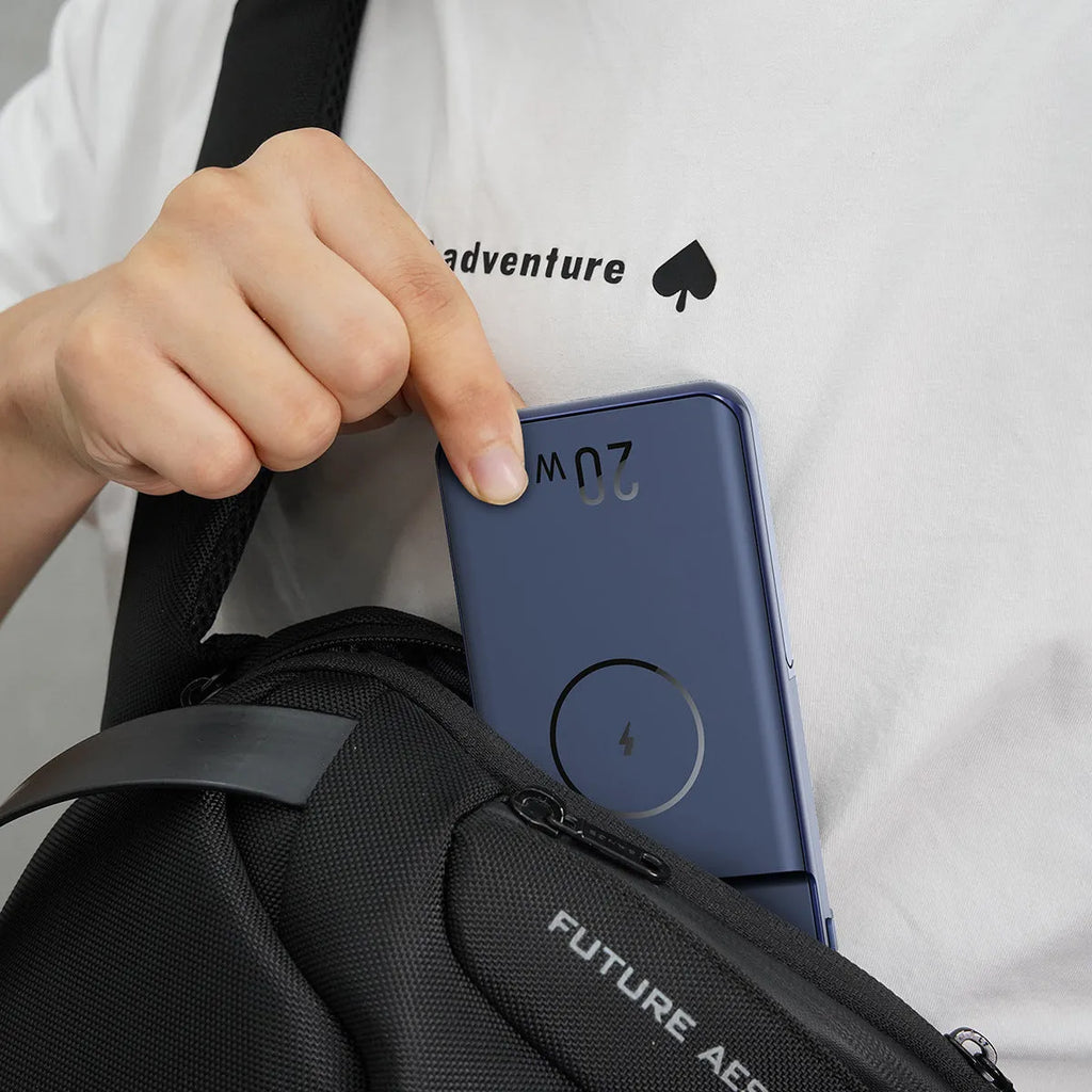 Black magnetic wireless power bank with bracket showing 10000mAh capacity and industrial design