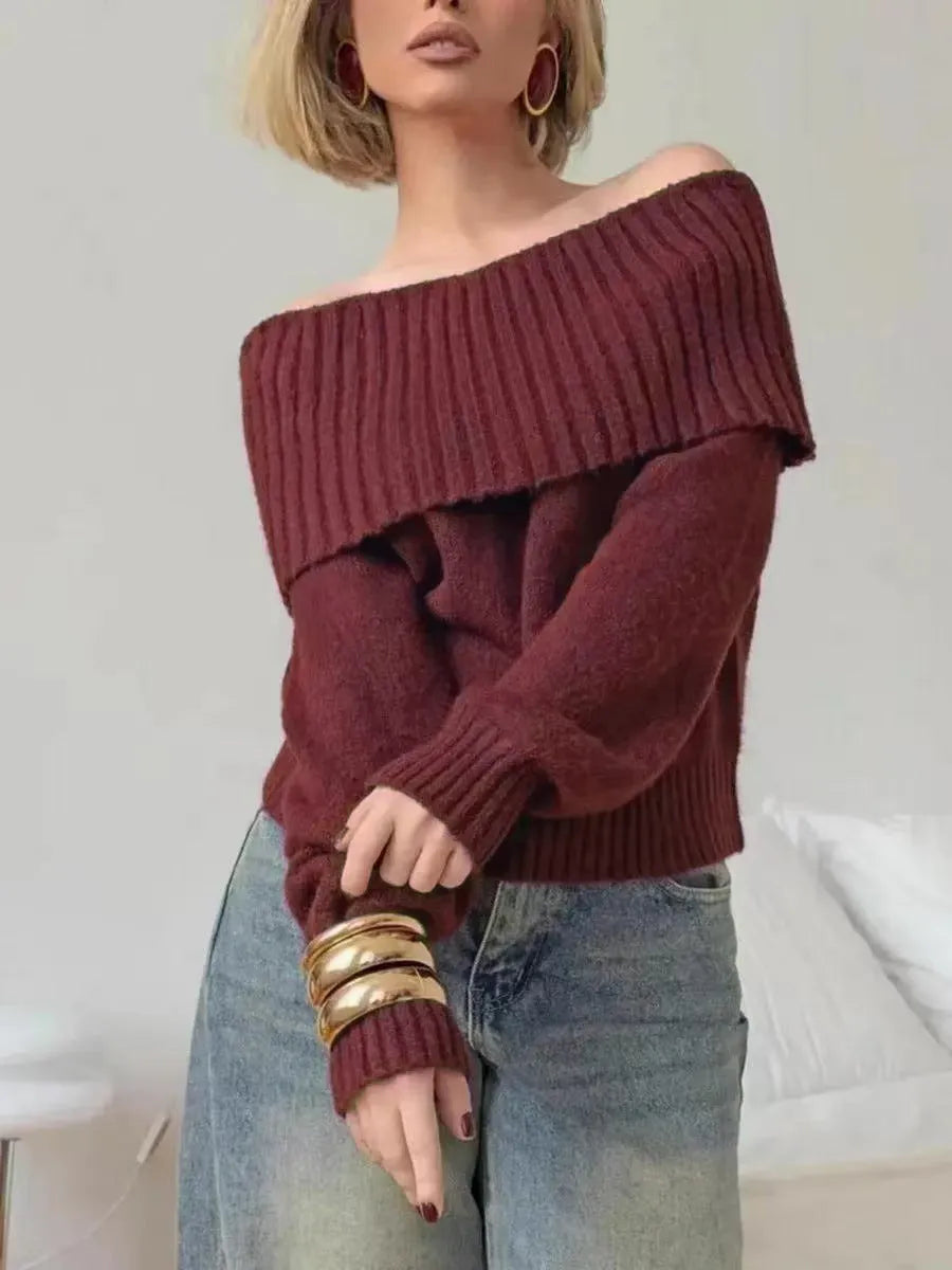 Off-the-shoulder grey sweater with 3D pattern and strapless design, showing regular sleeves and pullover style
