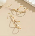 Gold-tone geometric spiral design drop earrings for women