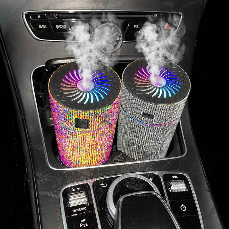 White diamond car humidifier measuring 14cm diameter on vehicle dashboard with USB cable connected