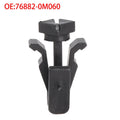 Black plastic automotive fastening clip for Nissan bumper and radiator grille, part number 76882-0M060.