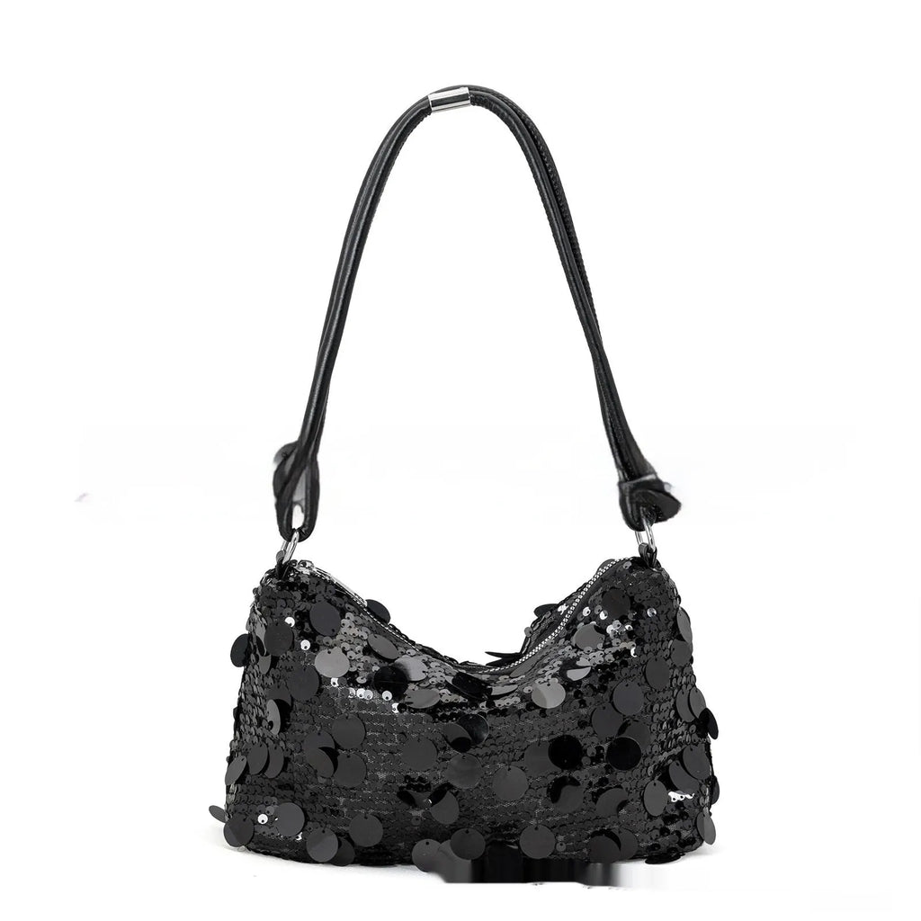 Gold, silver, or black soft polyester underarm crossbody bag measuring 25x11x15 cm.