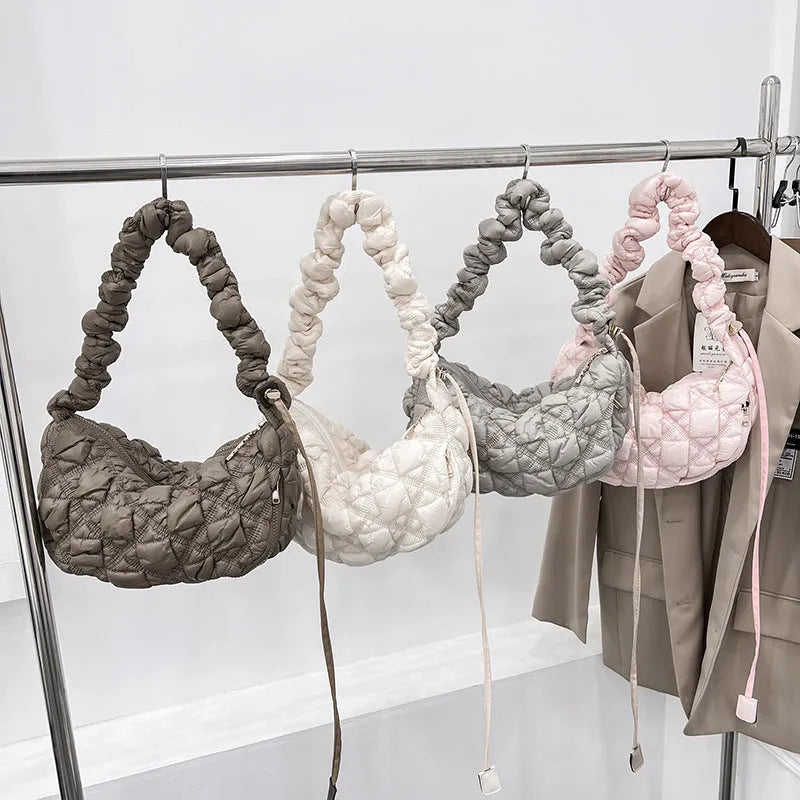 Women's nylon underarm bag in beige colour showing 35cm width and adjustable 120cm shoulder strap