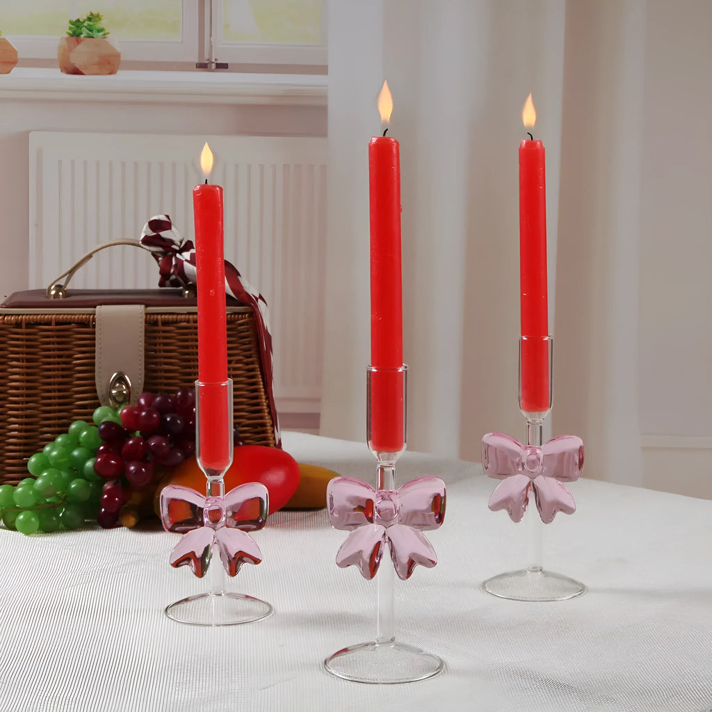 Handmade borosilicate glass bow candlestick holder with 2cm inner diameter and 7cm base, available in three heights