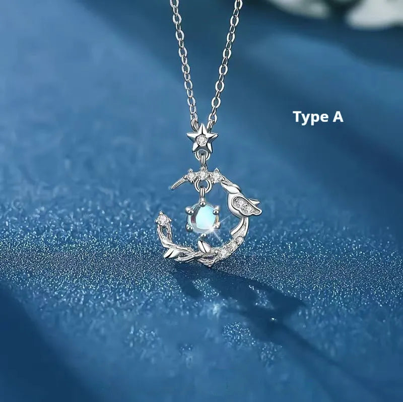 Women's adjustable tree and bird pendant necklace with geometric alloy design in blue eucalyptus colour