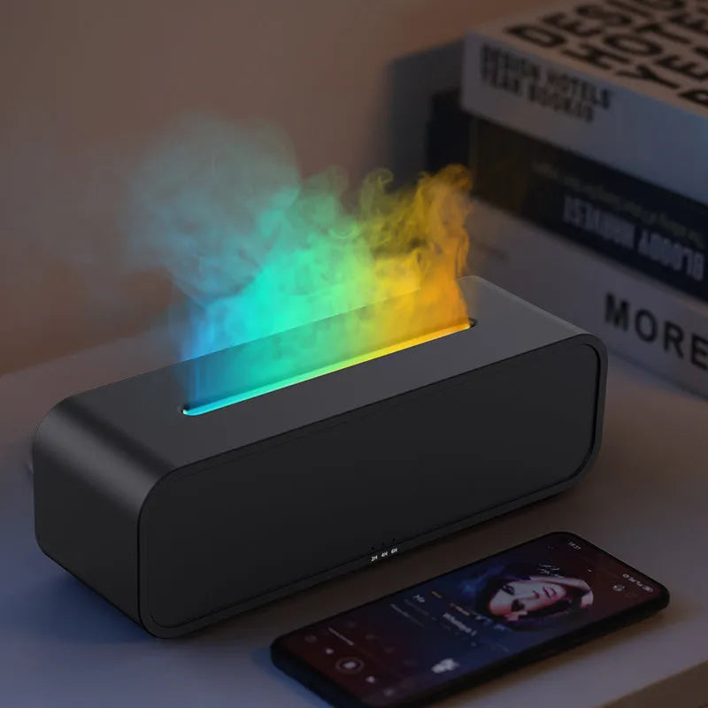 Black and white USB essential oil aroma diffuser with remote control and colour-changing flame light.