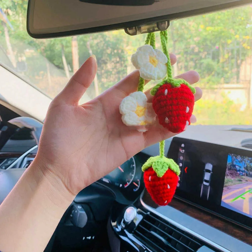 Handmade strawberry weaving car pendant with cotton hemp materials showing detailed stitching