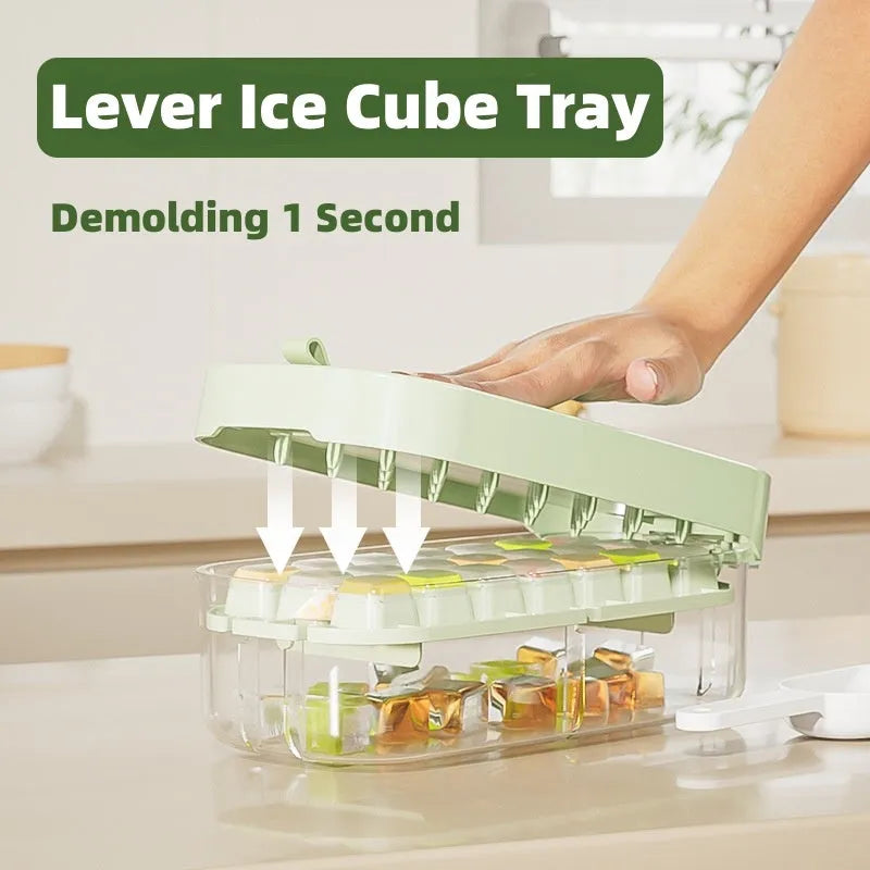 Ice cube tray with leverage demolding system and storage compartment for ice shovel in kitchen setting