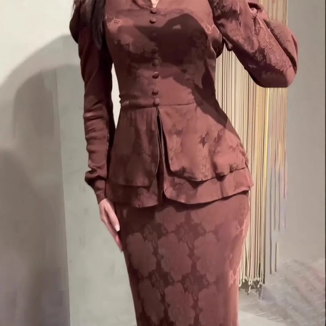Dark brown retro dress with floral print, long sleeves, and fake two-piece design on mannequin
